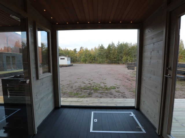 Stylish large windows in the sauna raft