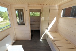 Vit bastuvoks i sauna-båten